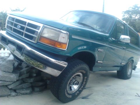 1996 Ford Bronco - there's a bunch of busted up concrete in my parking spot. what do you think im going to do? I love how my truck flexes better then a jeep
