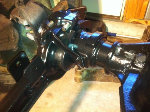 1979 Ford Bronco - Black painted steering linkage assembly, likely for a 4x4 vehicle.