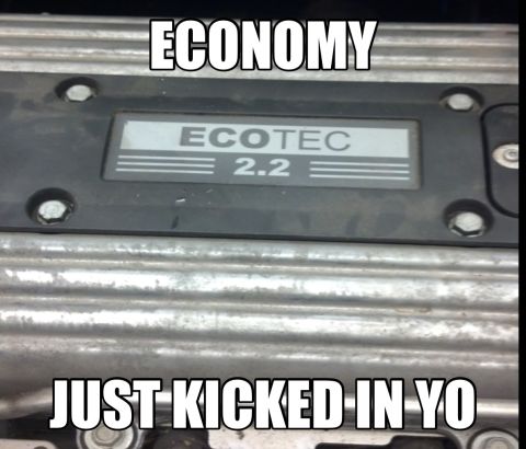 2000 Mercury Grand Marquis - A meme an engine's Ecotec 2.2 badge with text about economy.