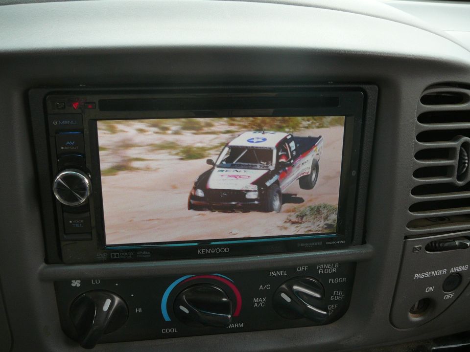 Off-road racing truck with TRD graphics on screen