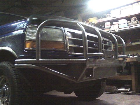 1989 Ford Bronco - Custom brush guard on a blue Ford F-Series truck.