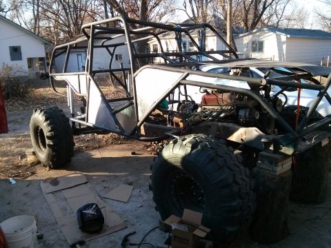 1986 Ford Bronco - This custom-built buggy is undergoing construction, a roll cage and oversized tires.