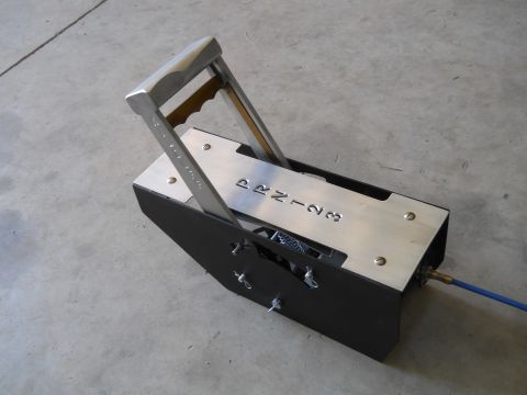 1992 Ford Bronco - Automatic transmission shifter with P-R-N-1-2-3 markings and a blue cable.