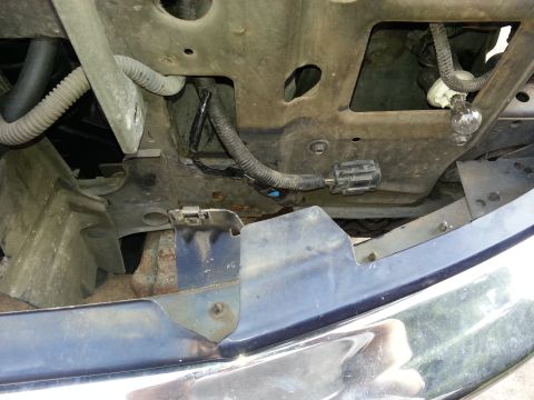 1994 Ford Bronco - A detailed view of mechanical suspension components, suggesting a focus on the vehicle's undercarriage or engine bay.