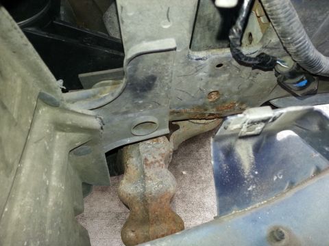1994 Ford Bronco - Undercarriage view showing suspension and frame components of a vehicle.