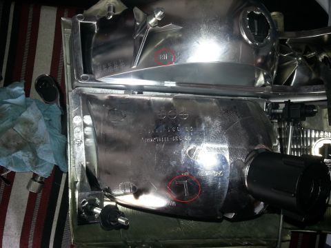 1994 Ford Bronco - Close-up of two vehicle headlight assemblies, one marked RH, showing internal components and part numbers.