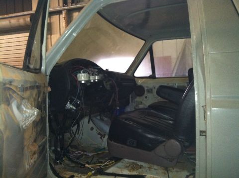 1991 Ford Bronco - Interior view of a 1991 Ford Bronco undergoing restoration, with exposed wiring and dashboard components.