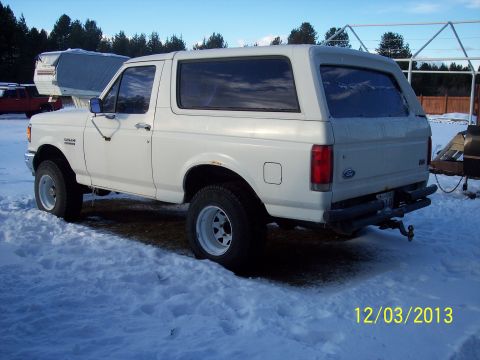 1990 Ford Bronco - This 1990 Ford Bronco is seen parked in the snow during winter.