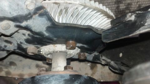 1993 Ford Bronco - Close-up of a radiator fan and shroud, showing mechanical components and mounting hardware.