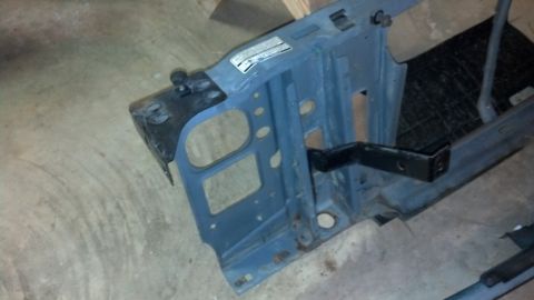 1993 Ford Bronco - A section of a vehicle's frame, possibly from the front end, is shown disassembled.
