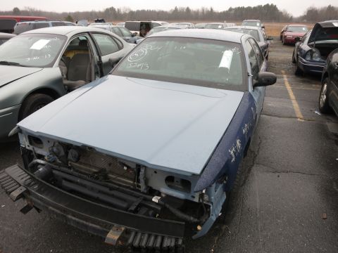 1991 Ford LTD Crown Victoria - This 1991 Ford Crown Victoria is missing its front end components and sits in a vehicle lot.
