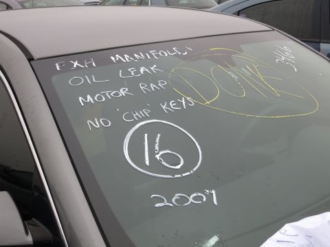 1991 Ford LTD Crown Victoria - Notes on a windshield indicate an oil leak, motor rap, and no chip keys, with the year 2007 noted.