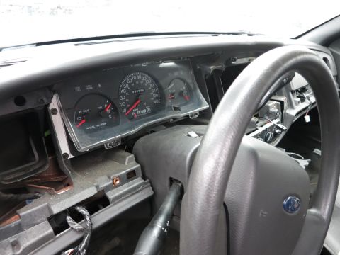 1991 Ford LTD Crown Victoria - Interior view of a 1991 Ford Crown Victoria LTD dashboard, with the instrument cluster disassembled.