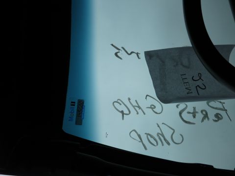 1991 Ford LTD Crown Victoria - Handwritten notes and a Mobil 1 sticker are visible on the interior of the windshield.
