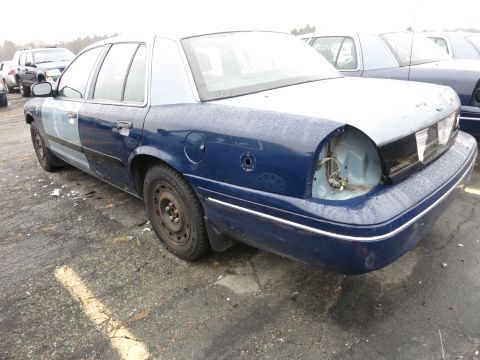 1991 Ford LTD Crown Victoria - This sedan has a two-tone paint job and is missing its rear taillight assembly.