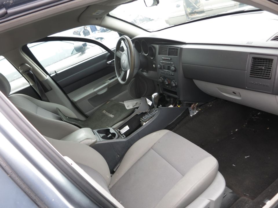 Interior of a Dodge Magnum showing the dashboard, seats, and center console