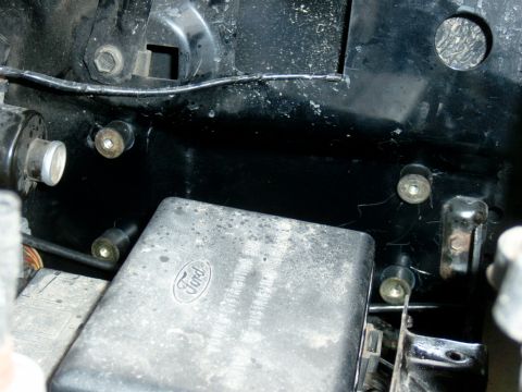 1995 Ford Bronco - The new home of the ignition, on the driver’s side fender right next to the factory distribution box. The ignition came with 4 little rubbe…