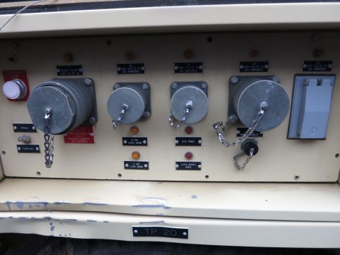 1991 Ford LTD Crown Victoria - Close-up of an electrical control panel multiple connection points and operational indicators.
