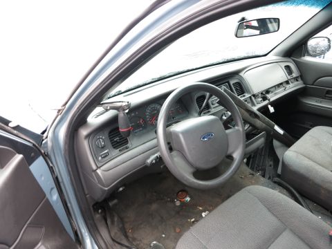 1991 Ford LTD Crown Victoria - Interior view of a Ford Crown Victoria, likely from the 2003-2011 generation, showing the dashboard and seats.