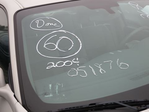 1991 Ford LTD Crown Victoria - Markings on the windshield obscure the interior of the vehicle.