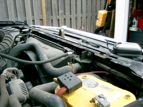 1995 Ford Bronco - I had to splice the power connections to make them long enough to reach the battery, and I ran them along the top of the radiator along the…
