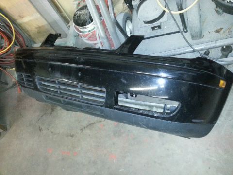 2002 Volkswagen Jetta - Front bumper assembly for a Volkswagen Jetta, likely from the early 2000s.