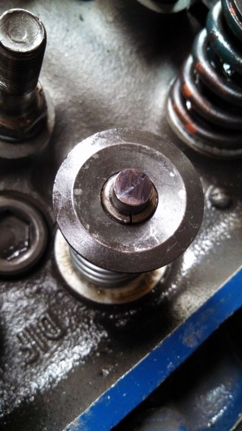 1967 Ford F-250 - Engine valve spring retainer and related components are shown in this close-up view.