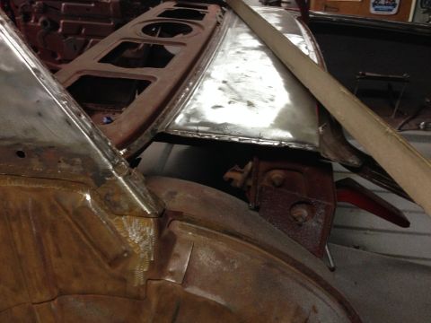 1964 Ford Fairlane - The rear body section of a 1964 Ford Fairlane shows significant rust and ongoing repair work.