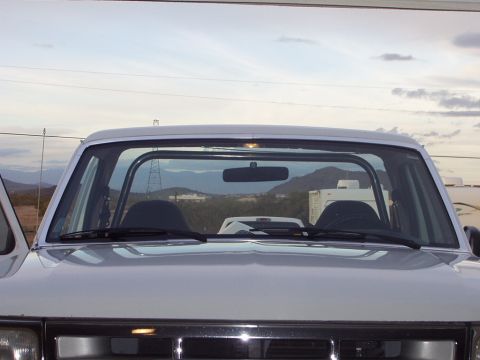 1993 Ford Bronco - Interior view of a 1993 Ford Bronco, highlighting the installed roll cage.