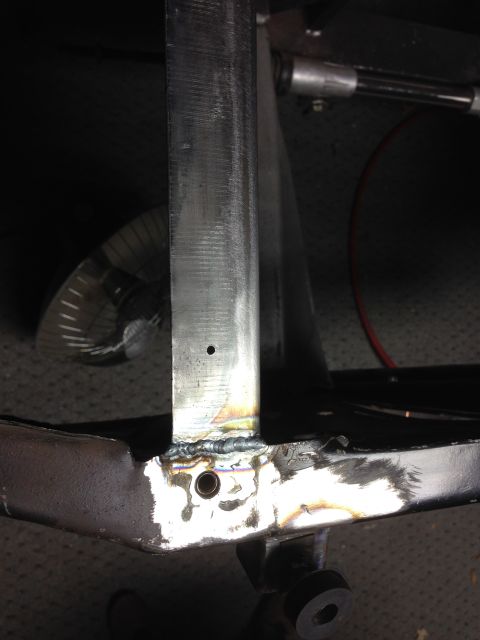 1964 Ford Fairlane - A close-up view of a welded metal frame section, showing the details of the fabrication.