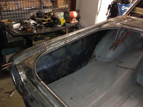 1964 Ford Fairlane - The trunk of a 1964 Ford Fairlane is shown undergoing bodywork and preparation.