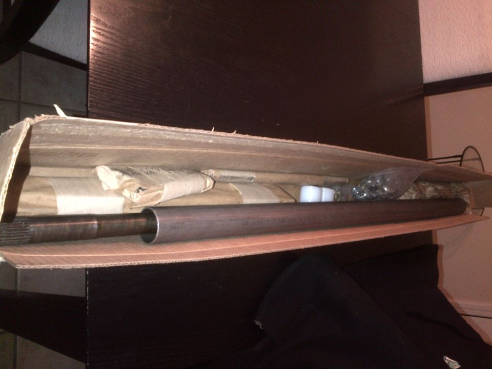 Drive shaft in cardboard box