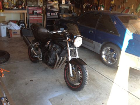 1998 Suzuki Bandit - Motorcycle and car in a garage setting.