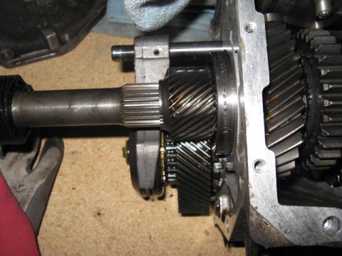1966 Ford Falcon - A detailed view of the internal components of a vehicle's transmission, showing various gears and shafts.