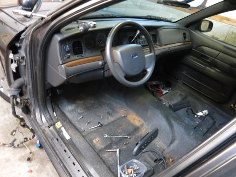 1991 Ford LTD Crown Victoria - Photograph of a Crown Victoria interior during teardown, not a technical document.