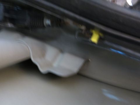 1991 Ford LTD Crown Victoria - Blurry photograph of a vehicle door jamb, not a technical document.