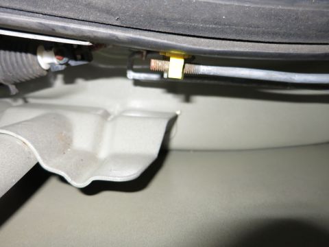 1991 Ford LTD Crown Victoria - Photograph of a vehicle door hinge and pillar, not a technical document.