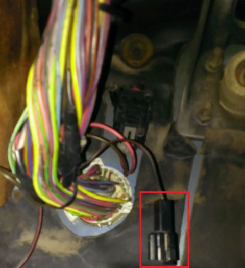 1988 Ford Bronco - This connector behind emergency brake, near fuel inertia switch, turned out to be for ABS diagnostics.
