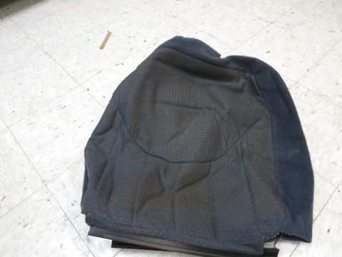 2001 Ford Crown Victoria - A dark blue car seat cover with a textured fabric pattern is shown laid out on a tiled floor.