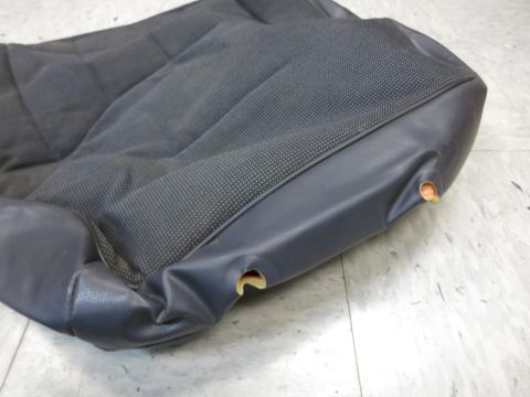 2001 Ford Crown Victoria - Close-up of a worn car seat cushion, likely from the driver's side.