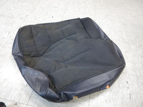 2001 Ford Crown Victoria - A detached car seat cushion is shown on a tiled floor, likely for replacement or repair.