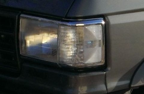 1988 Ford Bronco - Close-up of custom headlight