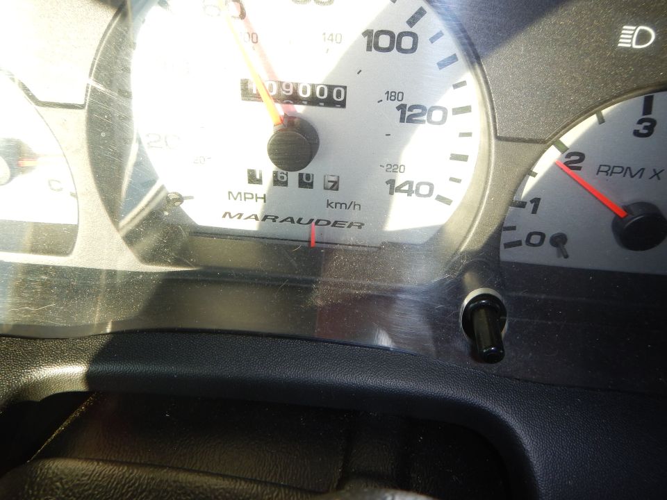Close-up of Marauder gauge cluster showing odometer 09000 and RPM x1000 dial