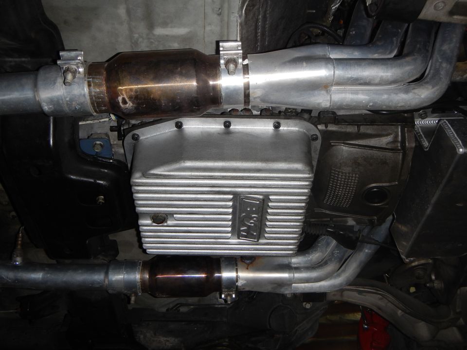 Underbody view of catalytic converter, oil pan and exhaust pipes