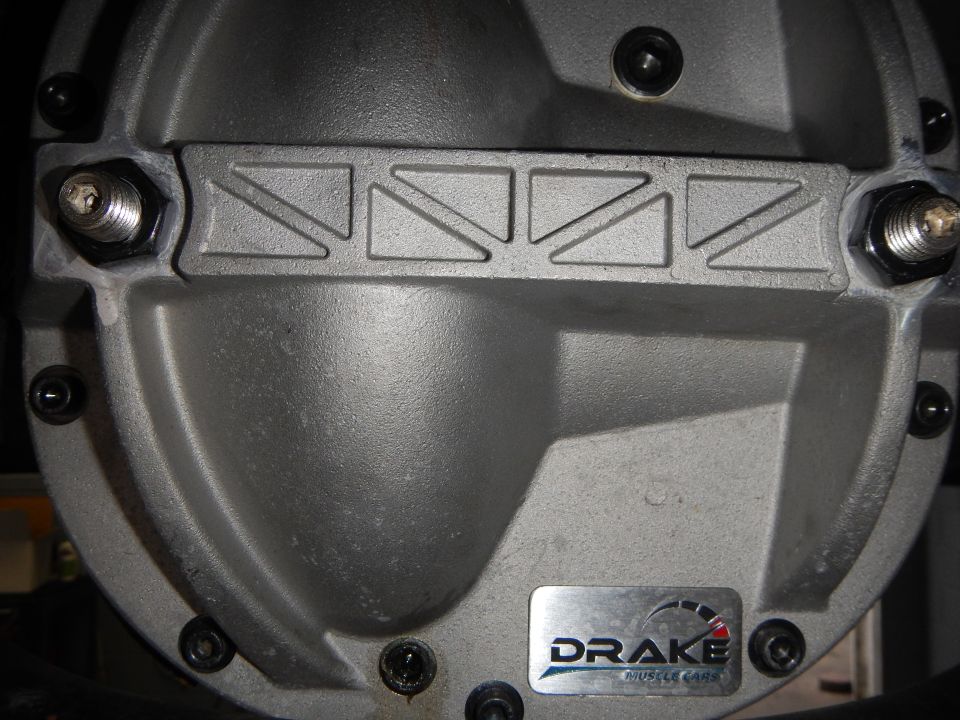 Close-up of an aluminum Drake Muscle Cars differential cover