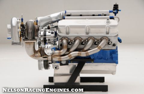 1994 Ford Bronco - Product photograph of a turbocharged Ford racing engine shown in side profile on a stand.