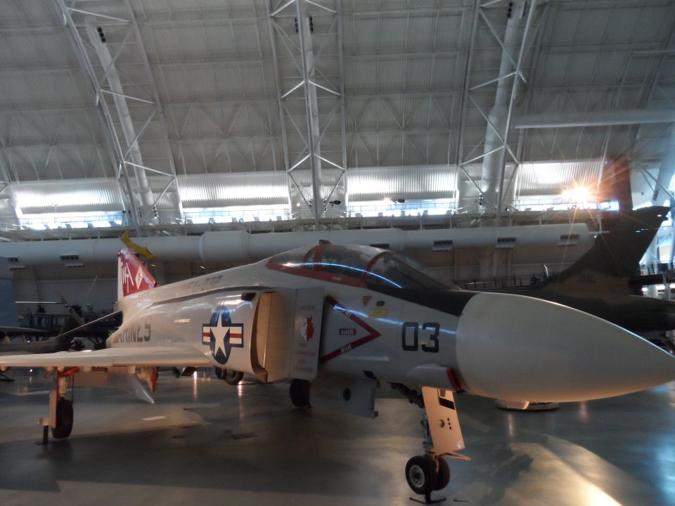 McDonnell Douglas F-4 Phantom II fighter jet with number 03 on the nose.