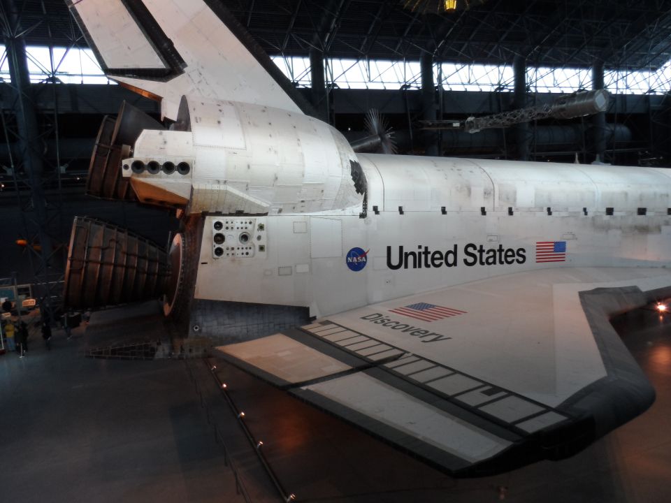 Space Shuttle Discovery with NASA logo and United States text on its side