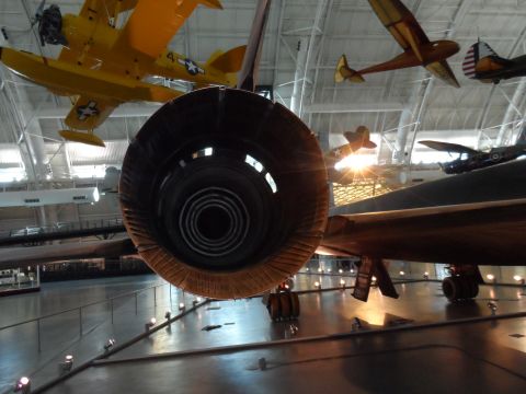 1971 Ford Ranchero - Museum display a jet engine and several vintage aircraft suspended from the ceiling.