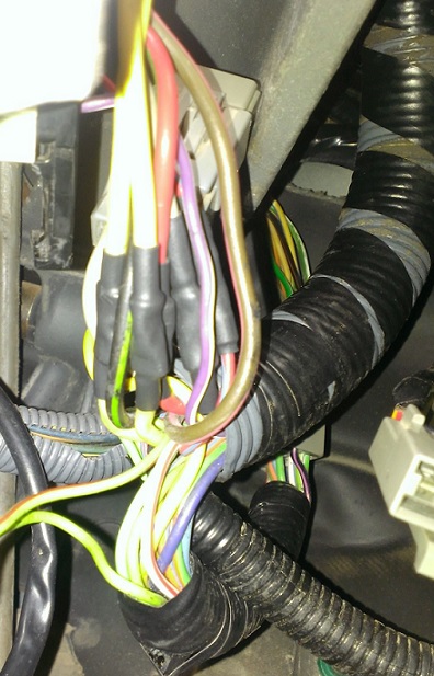 1988 Ford Bronco - Repaired ignition switch wires where aftermarket alarm was spliced in.